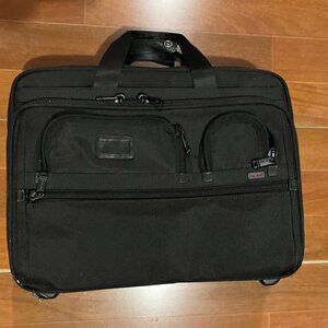 Tumi Deluxe 4 Wheeled Laptop Case Brief –  Good Condition